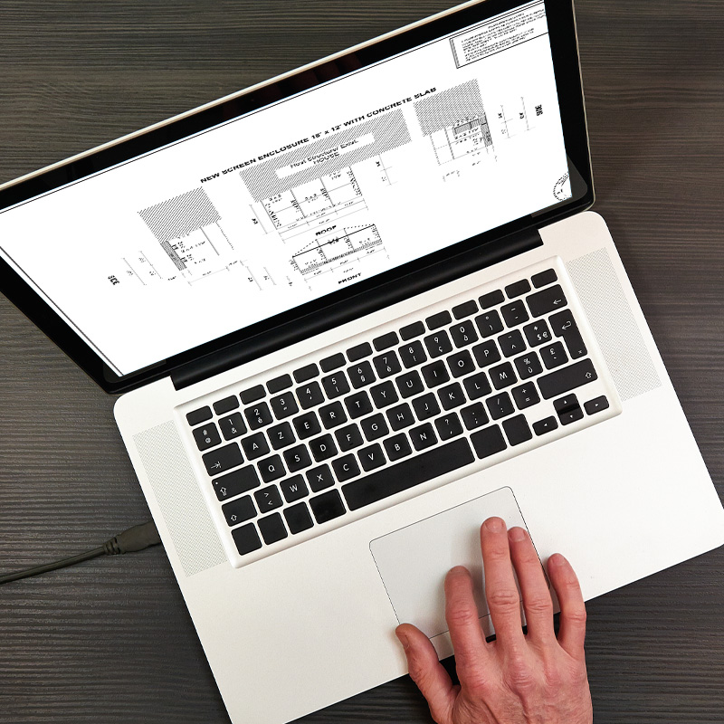 Laptop showing our engineering plans for our process. Front lanai installation review. Screen enclosures. Screening a lanai. Screen enclosures near me. Sunrooms Orlando Florida. Poop Lanai. Sunroom Orlando fl. Lanai Patio enclosure. Patio enclosure suppliers. Patio cover with screen. Pool enclosure florida. patio cover screen. florida screened in porch. screen patio covers. pool screen enclosures florida. screen pool enclosures florida. patio screen enclosures near me. florida porches