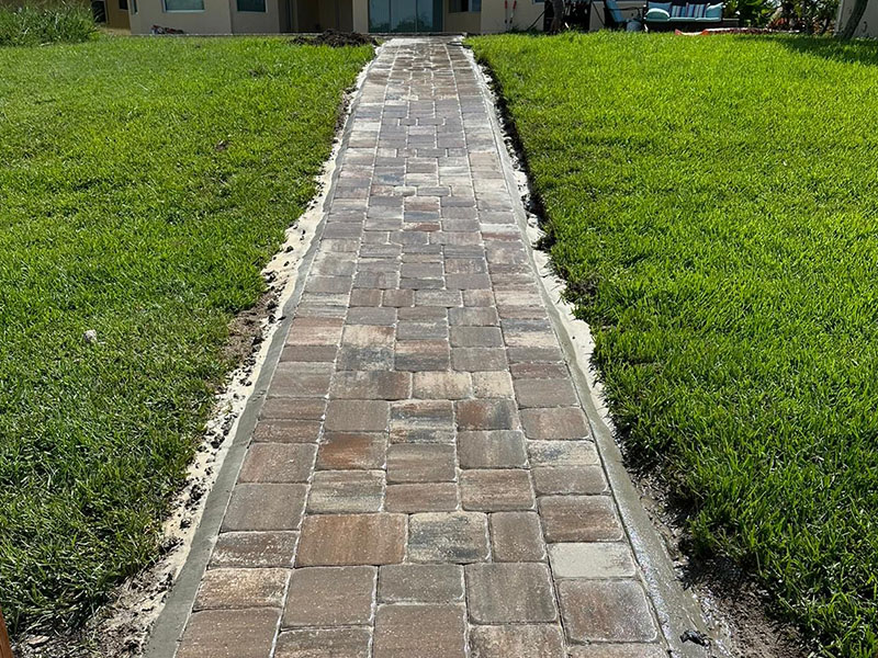 Oldcastle Coastal Mega Cambridge Napoli pavers walkway. Front lanai installation review. Screen enclosures. Screening a lanai. Screen enclosures near me. Sunrooms Orlando Florida. Poop Lanai. Sunroom Orlando fl. Lanai Patio enclosure. Patio enclosure suppliers. Patio cover with screen. Pool enclosure florida. patio cover screen. florida screened in porch. screen patio covers. pool screen enclosures florida. screen pool enclosures florida. patio screen enclosures near me. florida porches