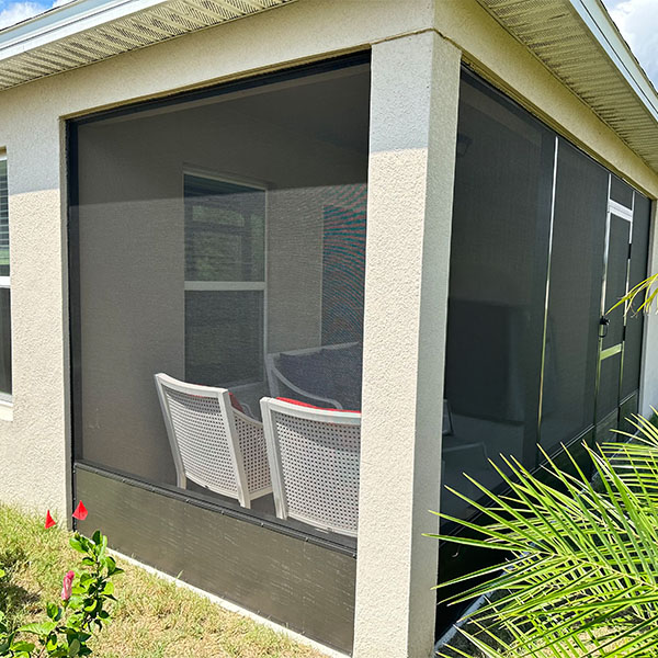 Rear lanai installation from the outside. Screen enclosures. Screening a lanai. Screen enclosures near me. Sunrooms Orlando Florida. Poop Lanai. Sunroom Orando fl. Lanai Patio enclosure. Patio enclosure suppliers. Patio cover with screen. Pool enclosure florida. patio cover screen. florida screened in porch. screen patio covers. pool screen enclosures florida. screen pool enclosures florida. patio screen enclosures near me. florida porches