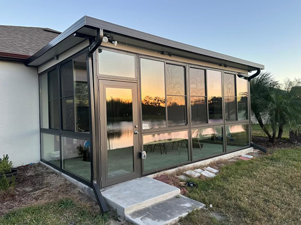 Screen enclosures. Screening a lanai. Screen enclosures near me. Sunrooms Orlando Florida. Poop Lanai. Sunroom Orando fl. Lanai Patio enclosure. Patio enclosure suppliers. Patio cover with screen. Pool enclosure florida. patio cover screen. florida screened in porch. screen patio covers. pool screen enclosures florida. screen pool enclosures florida. patio screen enclosures near me. florida porches