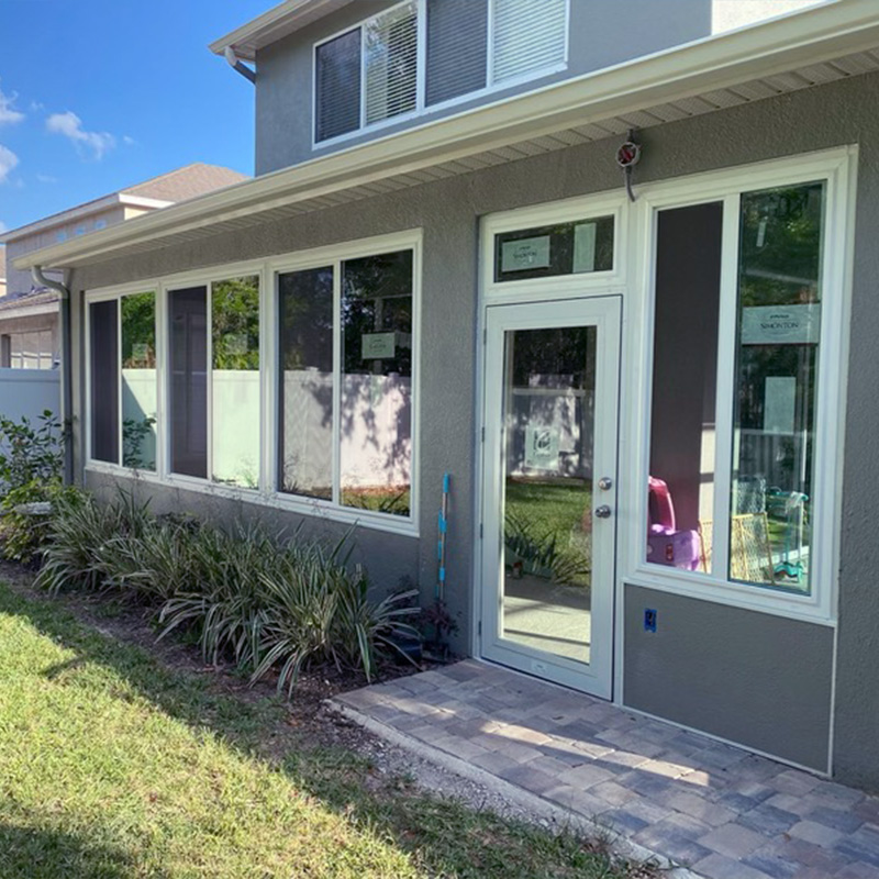 Our Process Step 4 Sunroom. Outside view of a finished sunroom. Front lanai installation review. Screen enclosures. Screening a lanai. Screen enclosures near me. Sunrooms Orlando Florida. Poop Lanai. Sunroom Orlando fl. Lanai Patio enclosure. Patio enclosure suppliers. Patio cover with screen. Pool enclosure florida. patio cover screen. florida screened in porch. screen patio covers. pool screen enclosures florida. screen pool enclosures florida. patio screen enclosures near me. florida porches