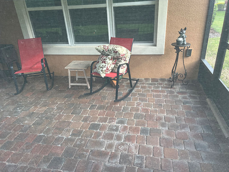 Existing bricks on rear lanai before transformation.