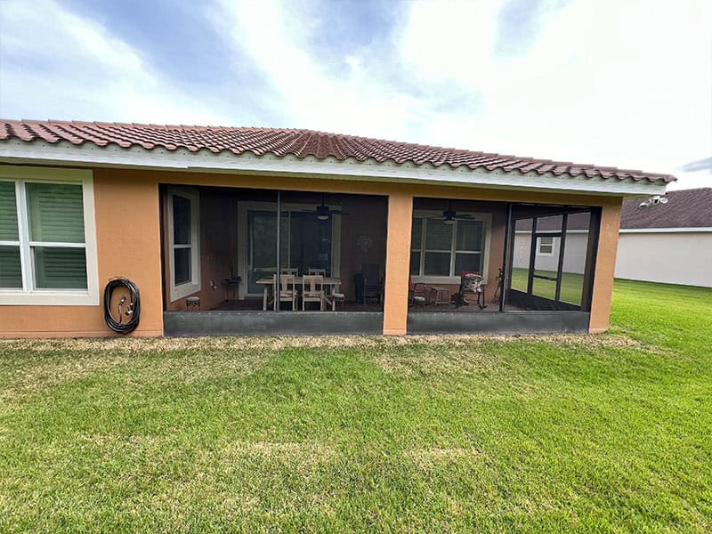 Front view of rear lanai in Poinciana, Florida before transformation