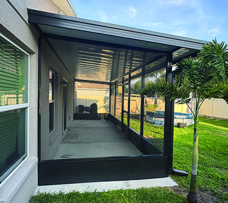 Side view of screen room transformation project in Winter Haven, Florida.