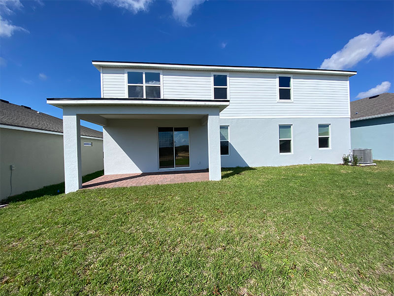 Before of the back patio without a screen.