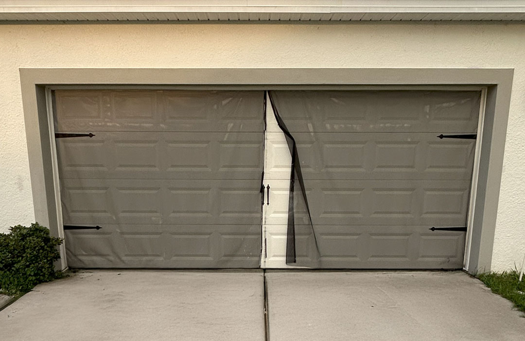 Velcro and magnetic garage screen worn out.