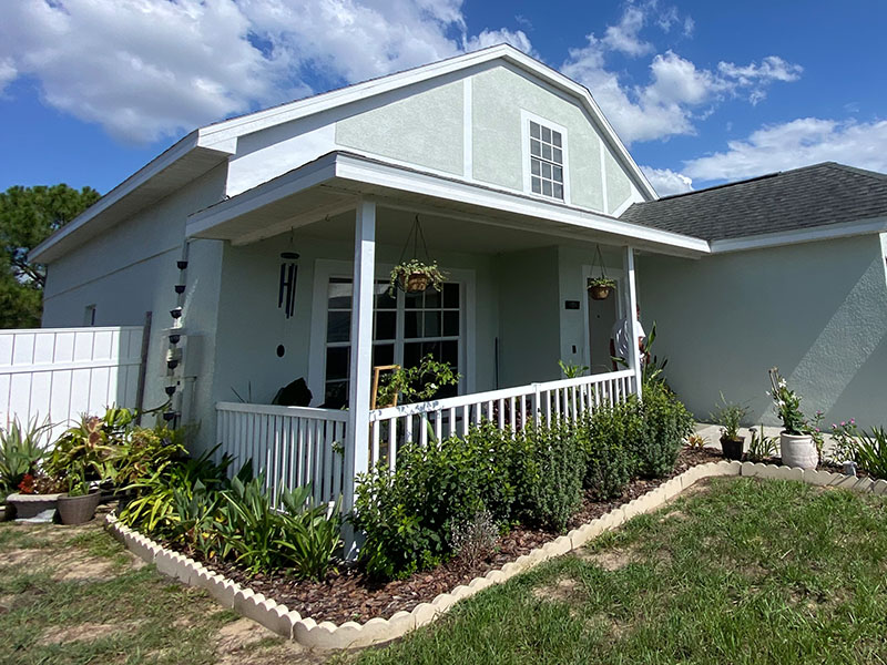 Front patio before screen enclosure installed in Davenport.