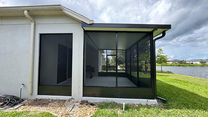 Side view of finished screen room installation in St. Cloud.