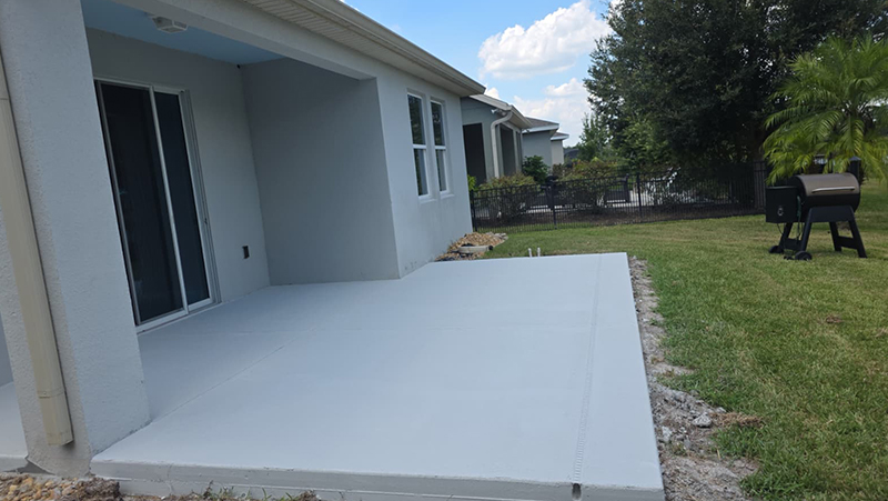 Concrete cured for screen room installation in St. Cloud.