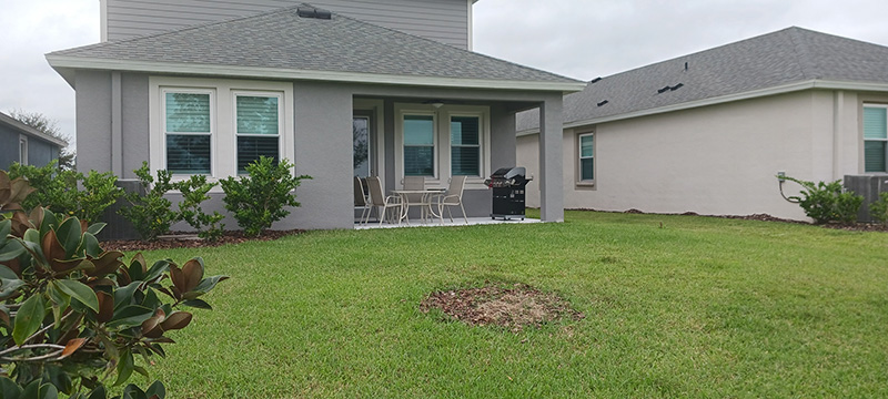 Photo taken by MD Construction sales person during the free consultation showing the existing back patio lanai to asses how big and how much the screen enclosure installation would cost in Lakeland, Polk County Florida.