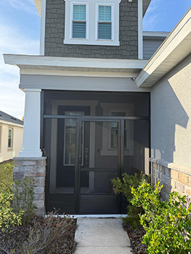 Front entry way screen enclosure with custom framing around columns