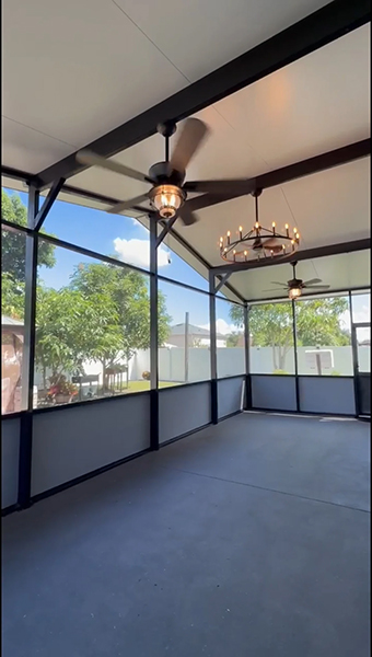 inside-view-with-fan-and-lighting-installed Inside view of screen room installation in Kissimmee from MD Construction and screen enclosure company located in Winter Haven Florida.
