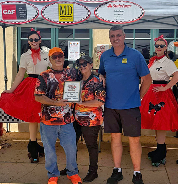 Solivita annual car show winners of the MD award Game of Thrones jeep wrangler. MD construction sponsoring this annual car show as a red corporate sponsor choice
