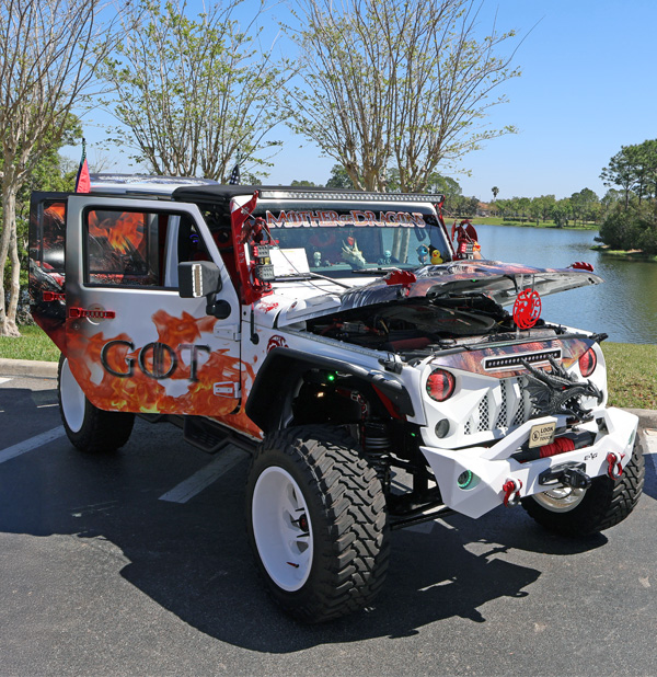 Solivita annual car show custom game of thrones jeep wrangler jk unlimited on display. MD construction sponsoring this annual car show as a red corporate sponsor choice