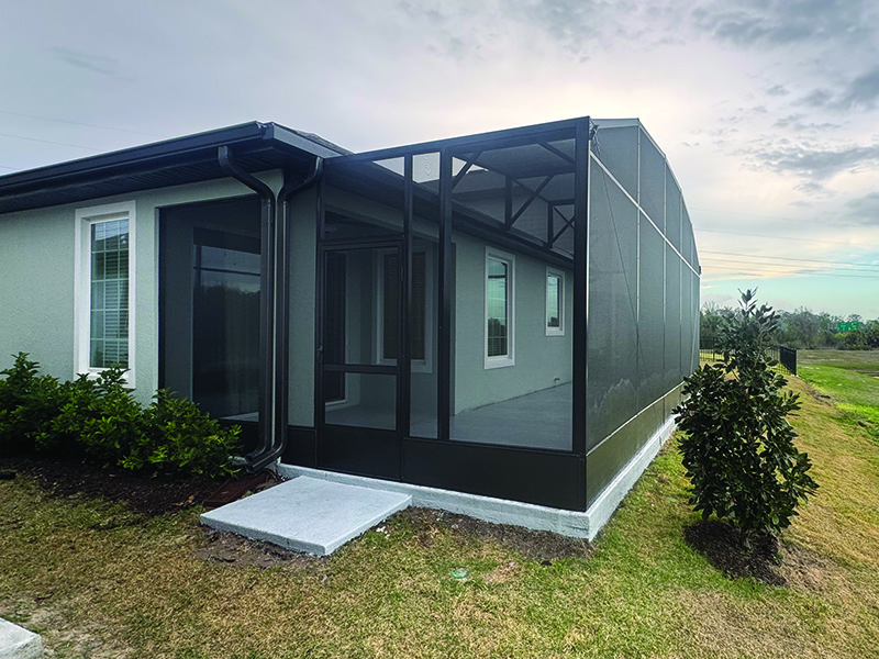 After photo of a recent patio expansion into screen enclosure job in Kissimmee, Florida.