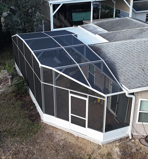 Aerial shot of screen enclosure installation in Davenport, Florida for customer review.