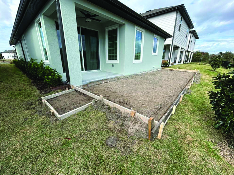 Forms for patio expansion concrete set in Kissimmee, Florida.