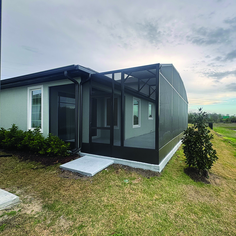 After photo of a recent patio expansion into screen enclosure job in Kissimmee, Florida.