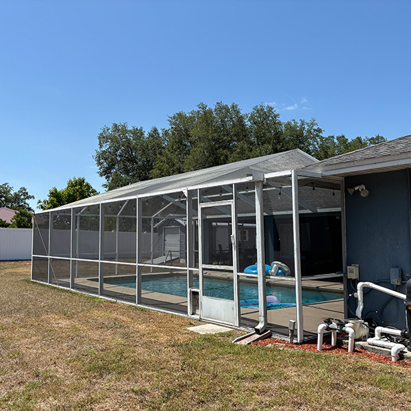 Outside view of the existing screen enclosure in Lakeland, Florida.