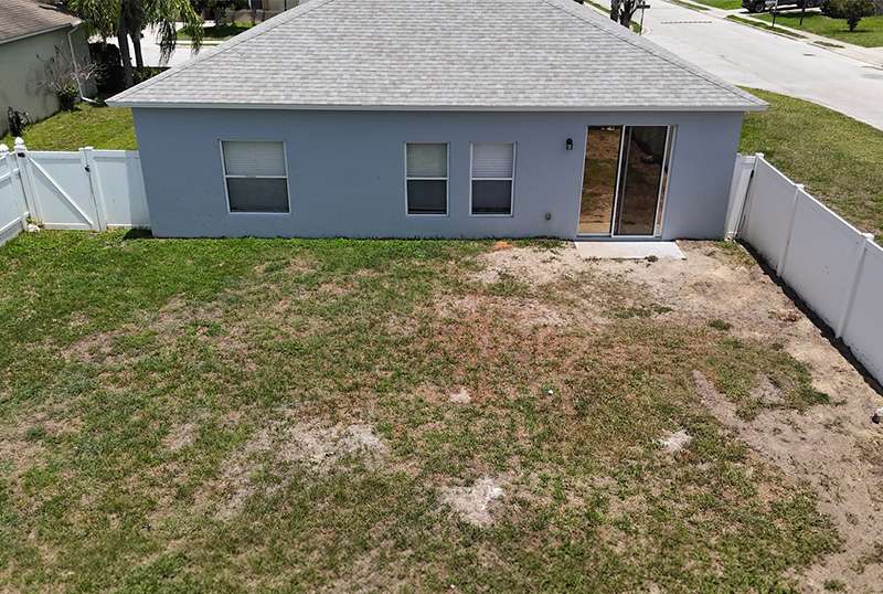 Front view before screen room installation in Auburndale, Florida.