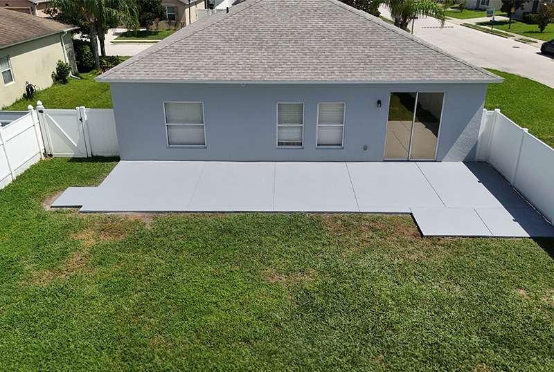 Front view of concrete cured ready for screen room in Auburndale, FL.